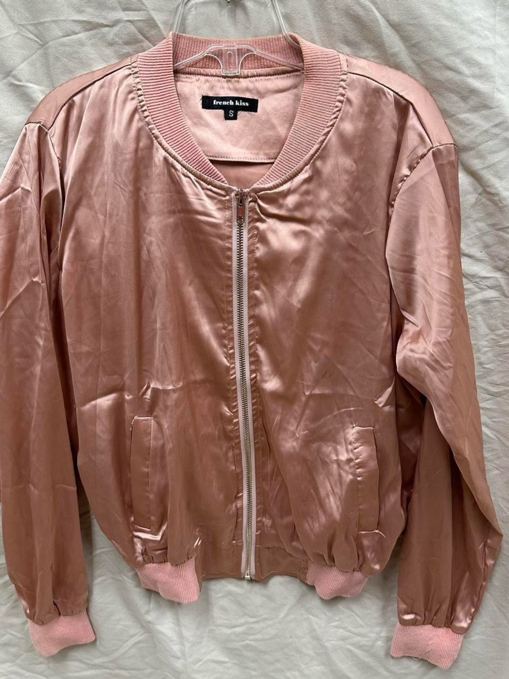 Shiny pink light jacket. Adult Size small.